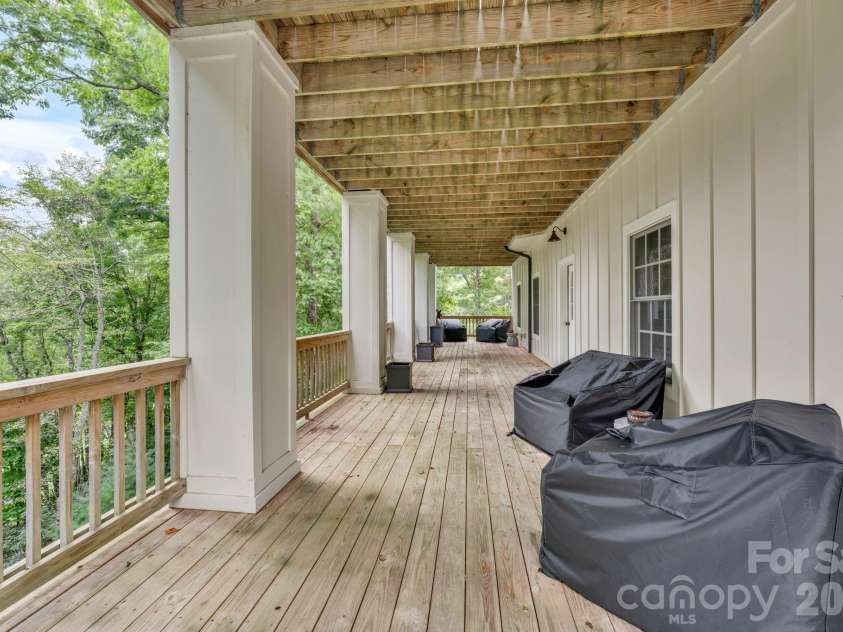 368 Green Hill Woods, Blowing Rock, NC 28605.  MLS# CAR4411772, YatesRealty ID 47263. Expansive lower-level deck