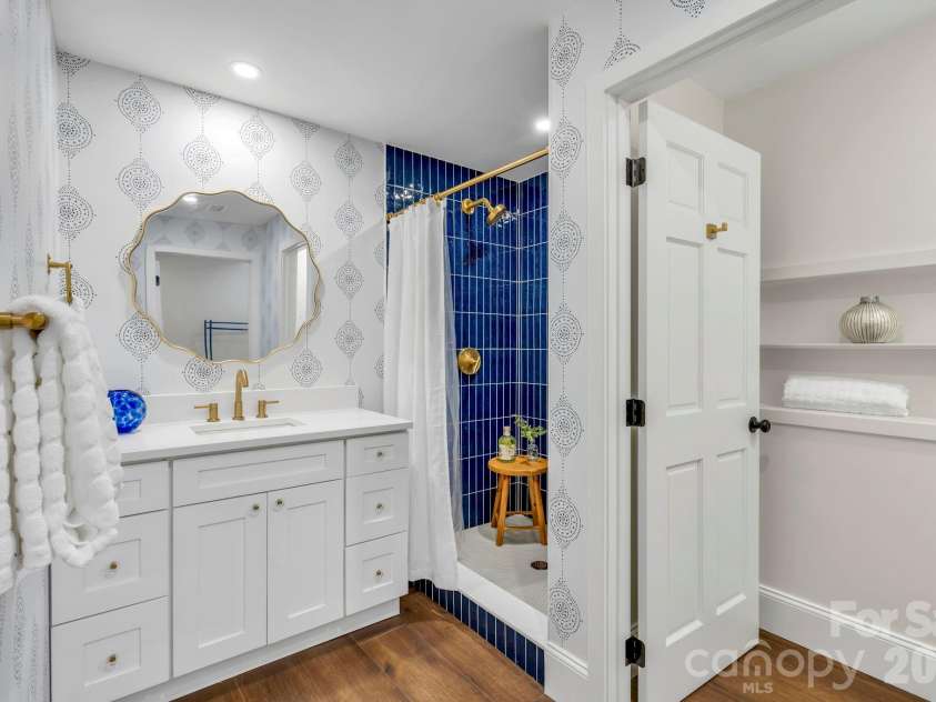 368 Green Hill Woods, Blowing Rock, NC 28605.  MLS# CAR4411772, YatesRealty ID 47263. Lower-level apartment suite full bath