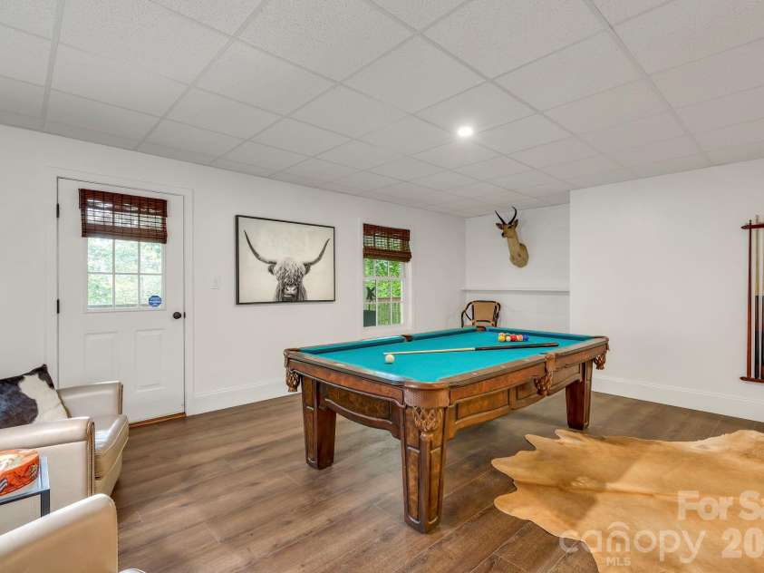 368 Green Hill Woods, Blowing Rock, NC 28605.  MLS# CAR4411772, YatesRealty ID 47263. Lower level living & game room