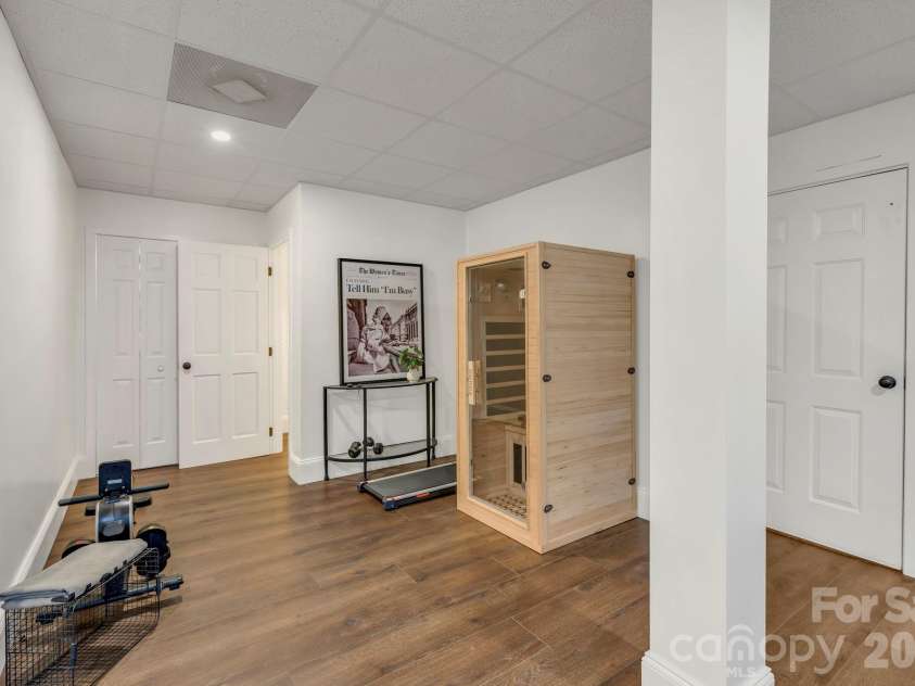 368 Green Hill Woods, Blowing Rock, NC 28605.  MLS# CAR4411772, YatesRealty ID 47263. Lower level living & game room