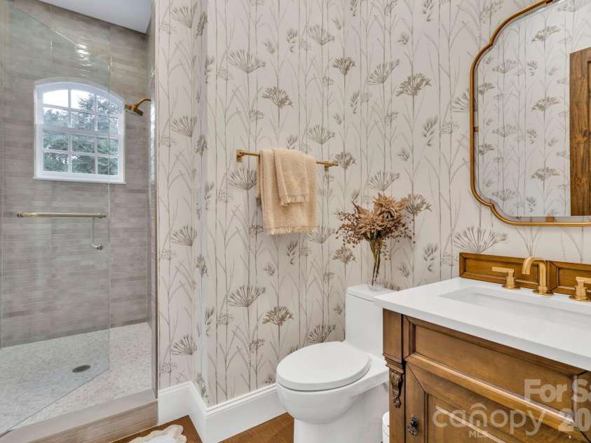 368 Green Hill Woods, Blowing Rock, NC 28605.  MLS# CAR4411772, YatesRealty ID 47263. Main-level bedroom suite 3 full bath
