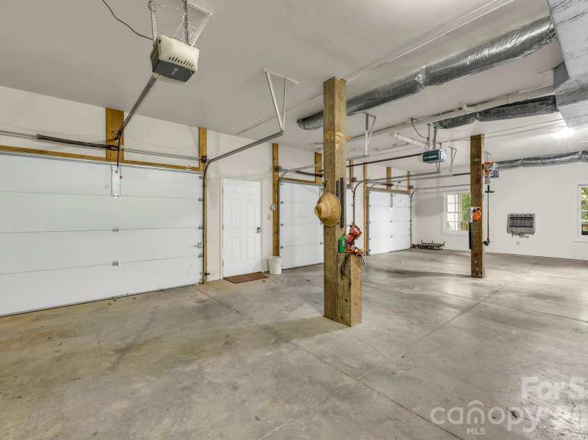 368 Green Hill Woods, Blowing Rock, NC 28605.  MLS# CAR4411772, YatesRealty ID 47263. Oversized three-car garage