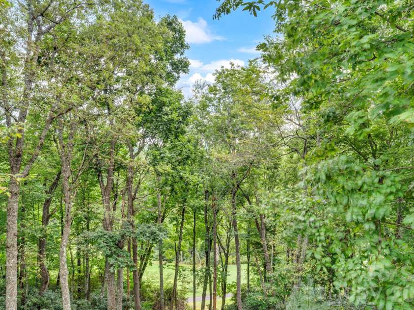 368 Green Hill Woods, Blowing Rock, NC 28605.  MLS# CAR4411772, YatesRealty ID 47263. Seasonal (11th Fairway!) golf course views from the main-level deck!
