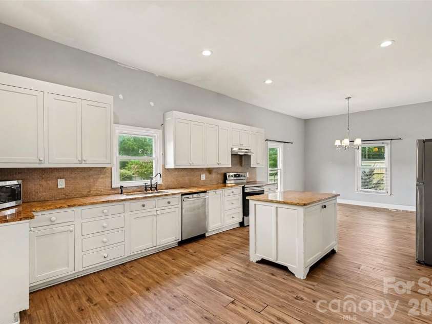227 Cauthen Street, Heath Springs, SC 29058.  MLS# CAR4404918, YatesRealty ID 47275. Kitchen and dining