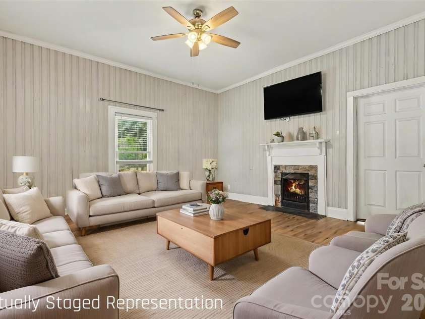 227 Cauthen Street, Heath Springs, SC 29058.  MLS# CAR4404918, YatesRealty ID 47275. Living Room *Virtually Staged*