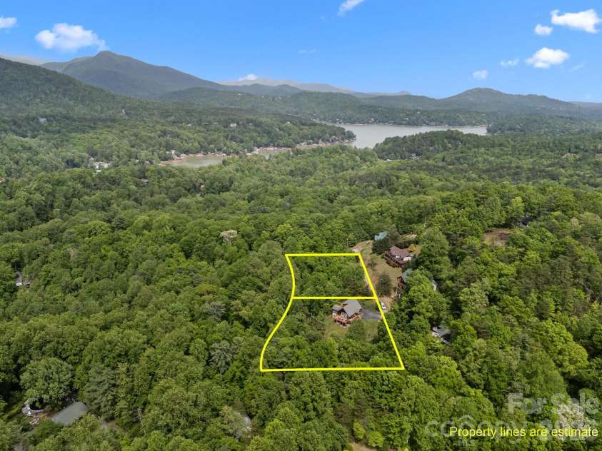 173 Mistletoe Park, Lake Lure, NC 28746.  MLS# CAR4252305, YatesRealty ID 4730. Property has a second lot for privacy