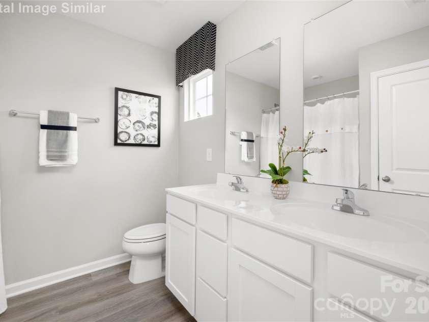 2271 Stephens Farm Drive, China Grove, NC 28023.  MLS# CAR4401127, YatesRealty ID 47302. Owners Bath with Dual Ceramic Sinks, Linen Closet