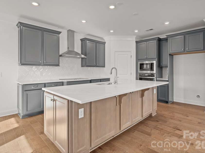 00 Bear Cliff Way, Lake Lure, NC 28746.  MLS# CAR4418550, YatesRealty ID 47303. KITCHEN PANTRY IN CORNER