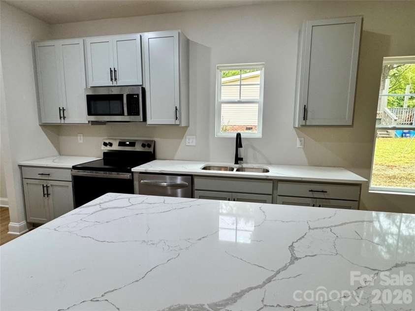 271 Melrose Drive, Concord, NC 28025.  MLS# CAR4413926, YatesRealty ID 47313. Kitchen