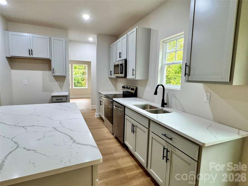 271 Melrose Drive, Concord, NC 28025.  MLS# CAR4413926, YatesRealty ID 47313. Kitchen
