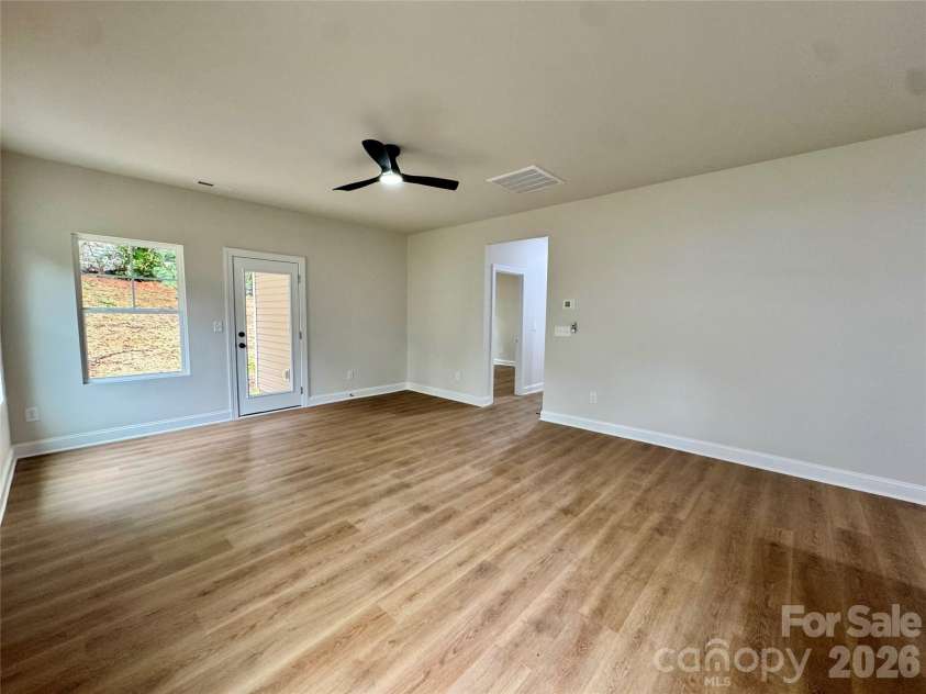 271 Melrose Drive, Concord, NC 28025.  MLS# CAR4413926, YatesRealty ID 47313. Living Room Area