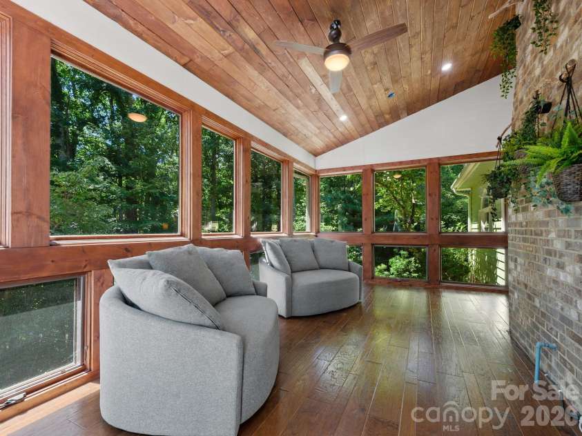 36 Windsong Drive, Fairview, NC 28730.  MLS# CAR4418309, YatesRealty ID 47314. Conditioned sunroom.