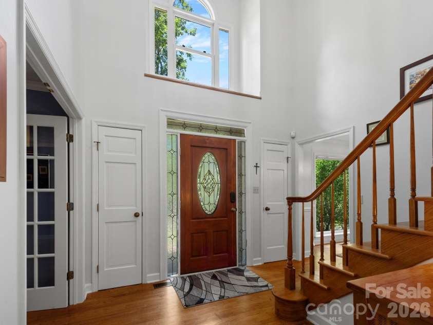 36 Windsong Drive, Fairview, NC 28730.  MLS# CAR4418309, YatesRealty ID 47314. Entry with wonderful light & coat closets