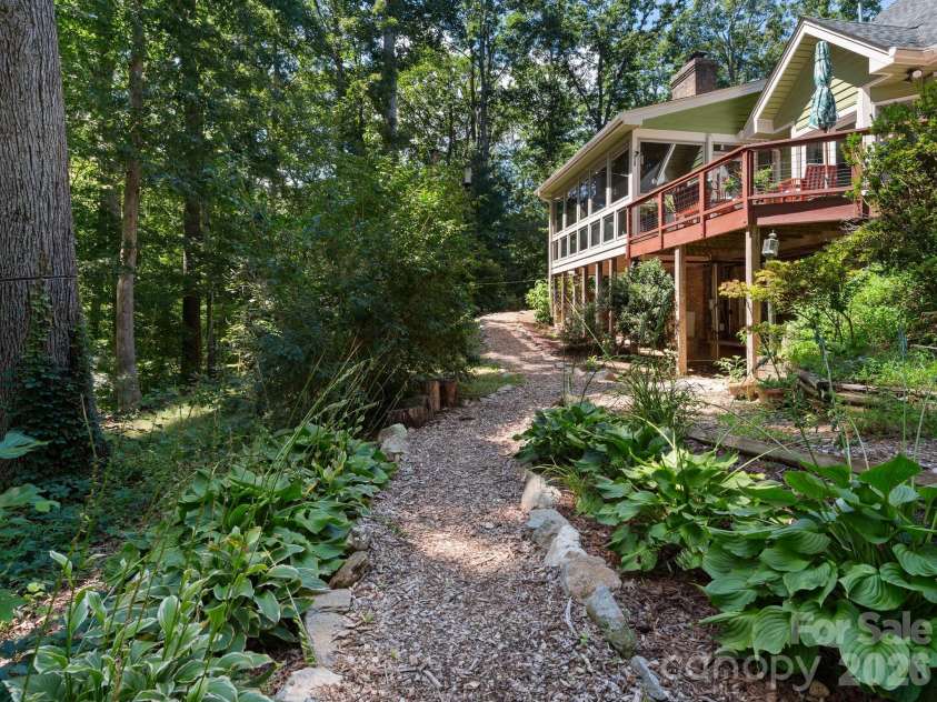 36 Windsong Drive, Fairview, NC 28730.  MLS# CAR4418309, YatesRealty ID 47314. Landscaped pathways