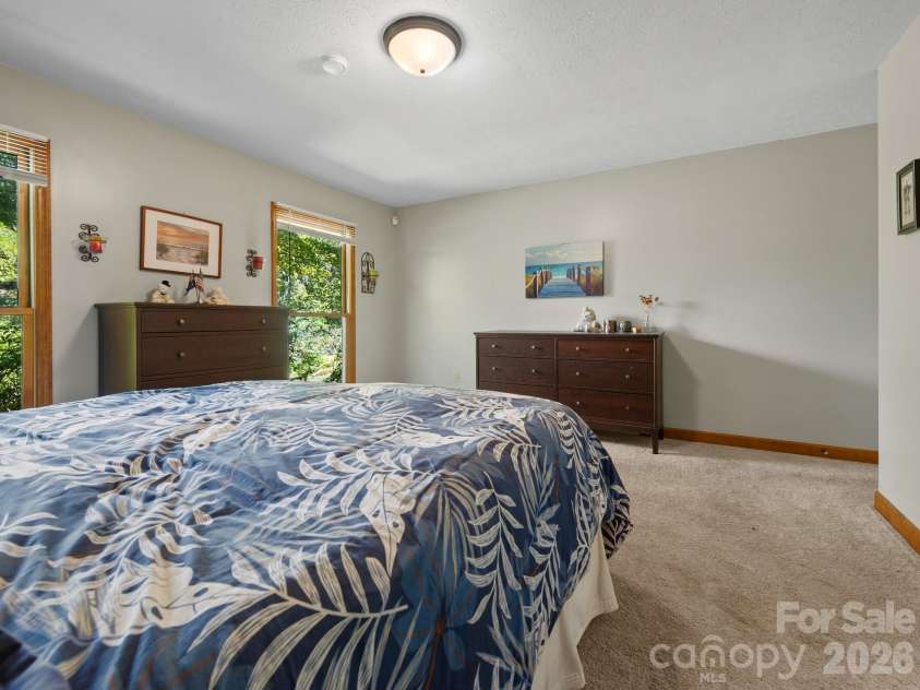 36 Windsong Drive, Fairview, NC 28730.  MLS# CAR4418309, YatesRealty ID 47314. Primary bedroom on main