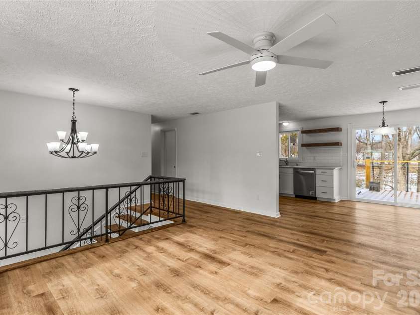 2474 Cedar Valley Drive, Conover, NC 28613.  MLS# CAR4342521, YatesRealty ID 4732. Living Room - Dining Room - Kitchen