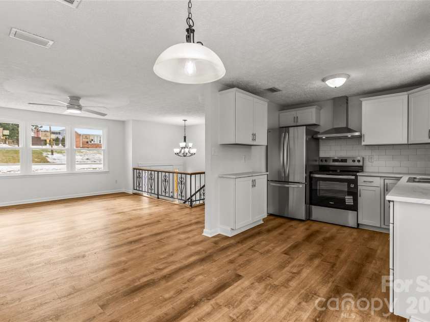 2474 Cedar Valley Drive, Conover, NC 28613.  MLS# CAR4342521, YatesRealty ID 4732. Living Room - Dining Room - Kitchen