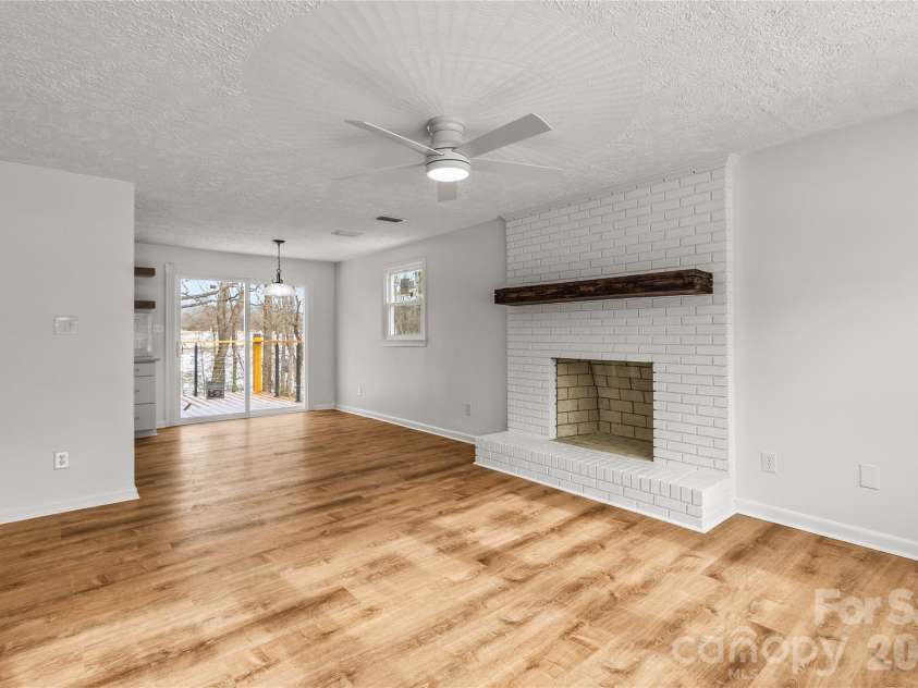2474 Cedar Valley Drive, Conover, NC 28613.  MLS# CAR4342521, YatesRealty ID 4732. Living Room w/ fireplace