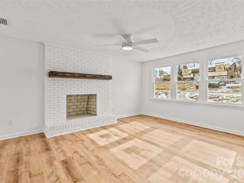 2474 Cedar Valley Drive, Conover, NC 28613.  MLS# CAR4342521, YatesRealty ID 4732. Living Room w/ fireplace