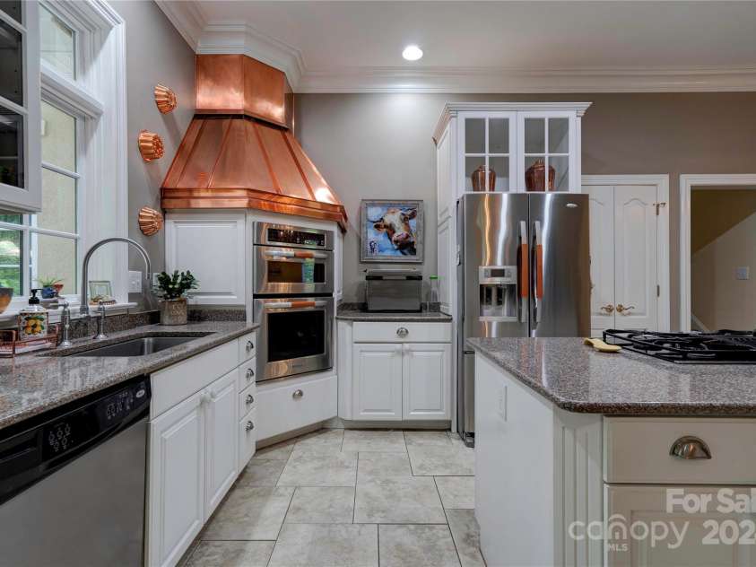 2929 Laura Road, Shelby, NC 28150.  MLS# CAR4127712, YatesRealty ID 4732. Kitchen area Copper accent above wall oven