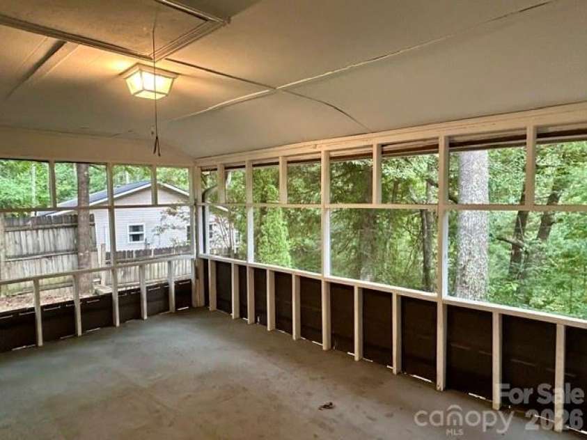 62 Kinard Lane, Penrose, NC 28766.  MLS# CAR4418956, YatesRealty ID 47323. Screened Porch