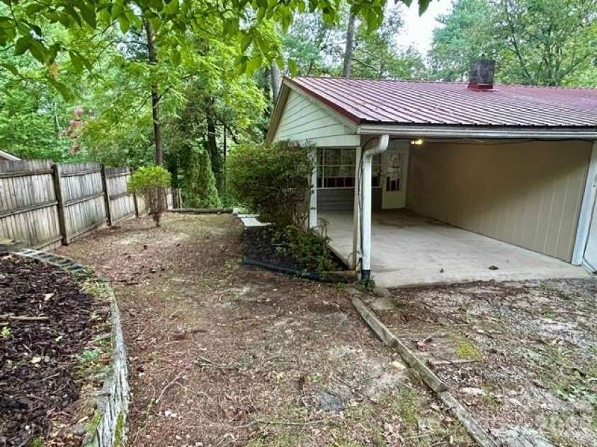 62 Kinard Lane, Penrose, NC 28766.  MLS# CAR4418956, YatesRealty ID 47323. Single carport