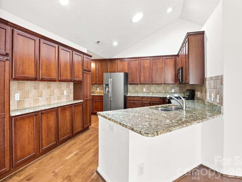 821 Ledgestone Court, Tega Cay, SC 29708.  MLS# CAR4419013, YatesRealty ID 47329. 