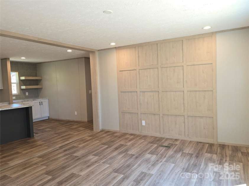 12 McGee Hill Road, Fairview, NC 28730.  MLS# CAR4234787, YatesRealty ID 4733. Large open living space. 