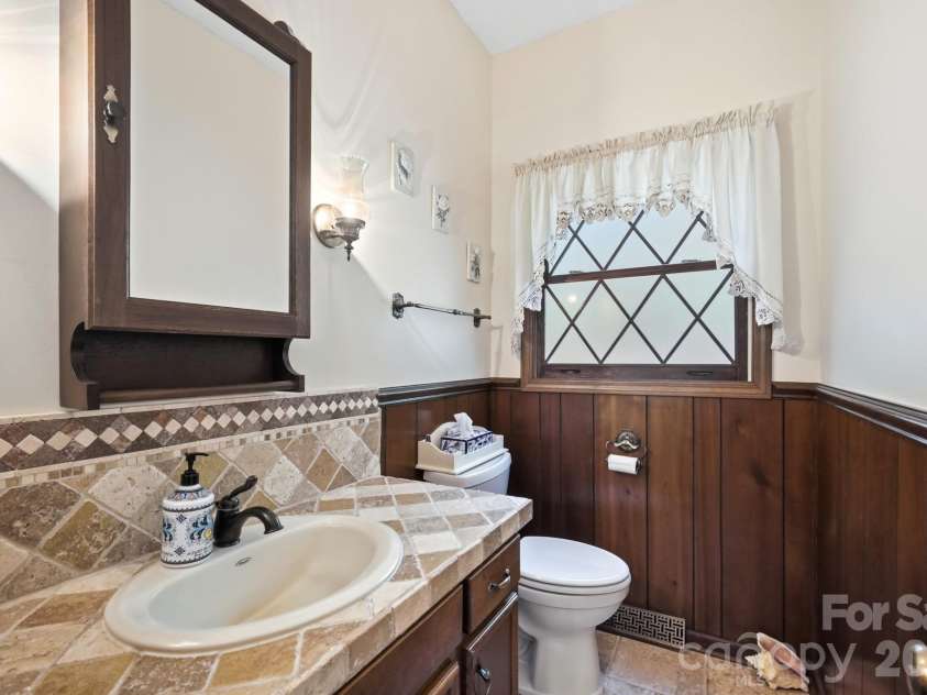 11300 NC Hwy 73 Highway, Mount Pleasant, NC 28124.  MLS# CAR4401793, YatesRealty ID 47331. Downstairs half bath