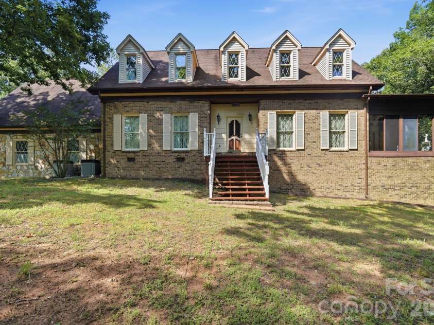11300 NC Hwy 73 Highway, Mount Pleasant, NC 28124.  MLS# CAR4401793, YatesRealty ID 47331. Front of Home