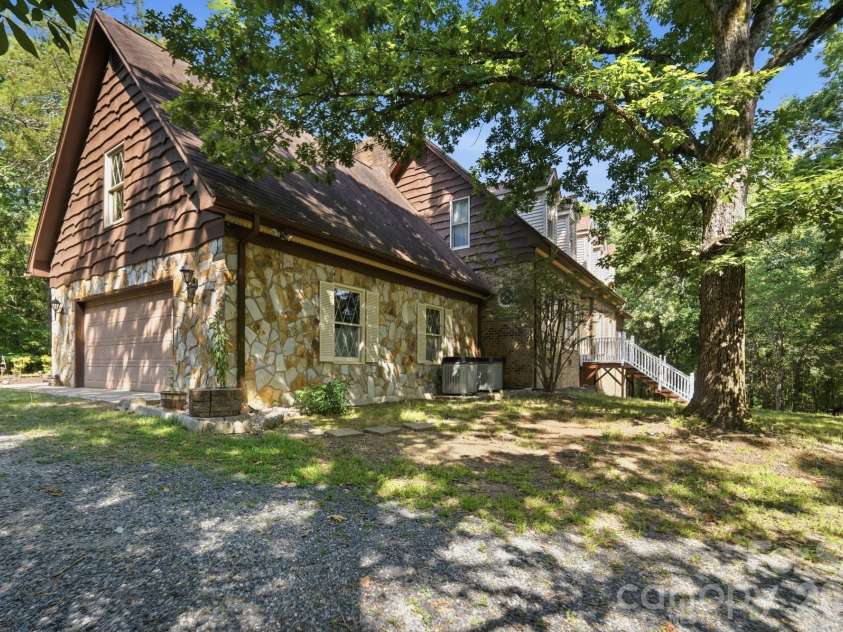 11300 NC Hwy 73 Highway, Mount Pleasant, NC 28124.  MLS# CAR4401793, YatesRealty ID 47331. Side/Front of Home