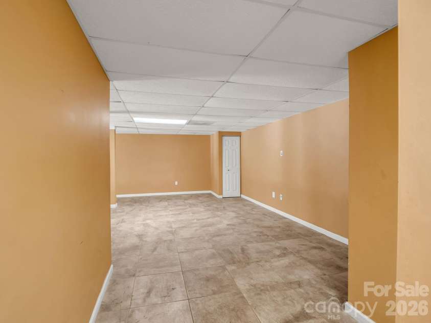 69 Ivy Lane, Fletcher, NC 28732.  MLS# CAR4417704, YatesRealty ID 47332. Basement/ Recreation room