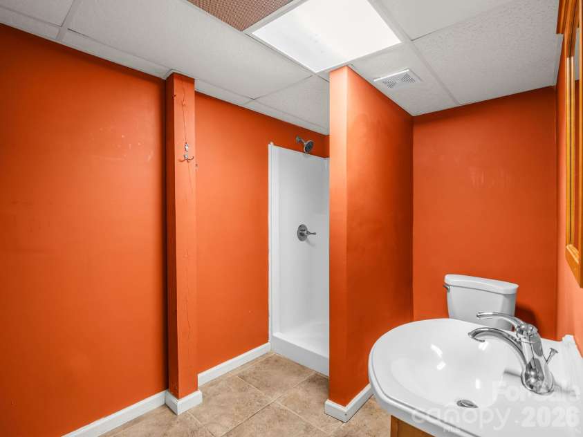 69 Ivy Lane, Fletcher, NC 28732.  MLS# CAR4417704, YatesRealty ID 47332. Down stairs Bath
