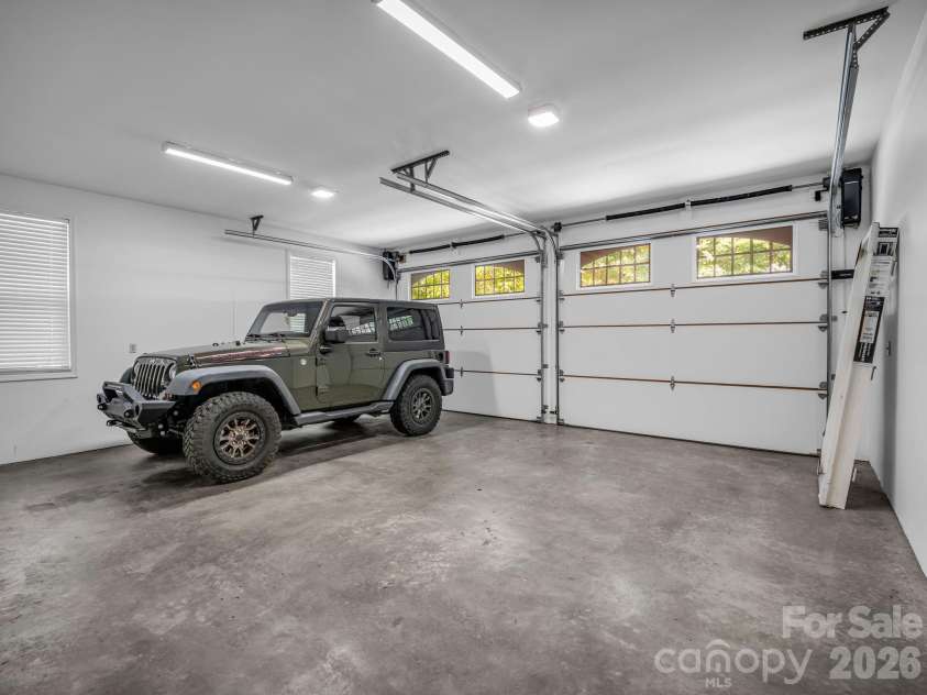 69 Ivy Lane, Fletcher, NC 28732.  MLS# CAR4417704, YatesRealty ID 47332. House Garage