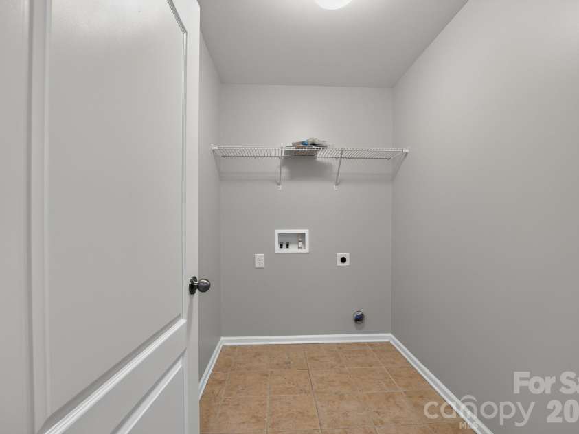 8224 Kelburn Lane, Charlotte, NC 28273.  MLS# CAR4419014, YatesRealty ID 47333. Laundry conveniently located on the second floor