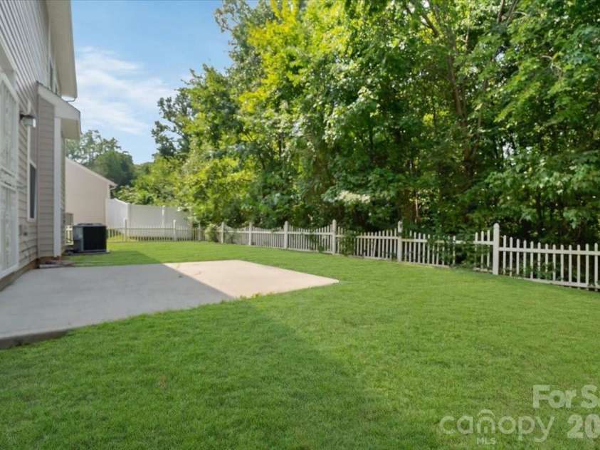 423 Mountain Quail Drive, Charlotte, NC 28216.  MLS# CAR4419011, YatesRealty ID 47334. Digitally Enhanced Lawn