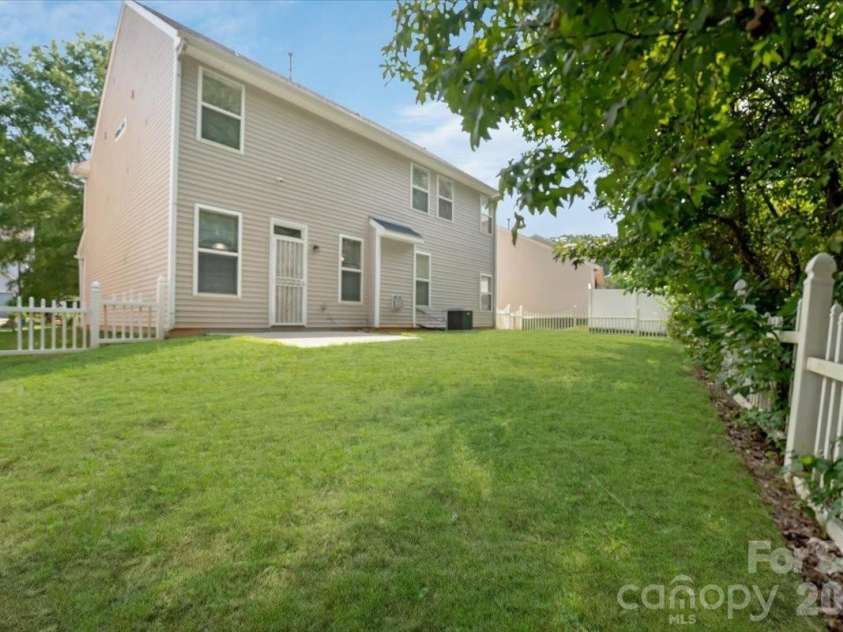 423 Mountain Quail Drive, Charlotte, NC 28216.  MLS# CAR4419011, YatesRealty ID 47334. Digitally Enhanced Lawn