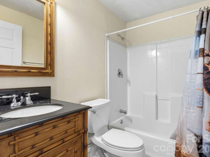 11 Roberts Drive, Swannanoa, NC 28778.  MLS# CAR4352970, YatesRealty ID 4734. Basement bathroom