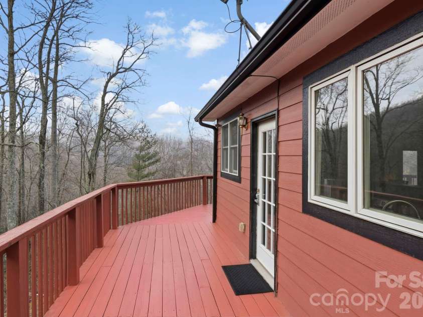11 Roberts Drive, Swannanoa, NC 28778.  MLS# CAR4352970, YatesRealty ID 4734. Giant wrap around porch