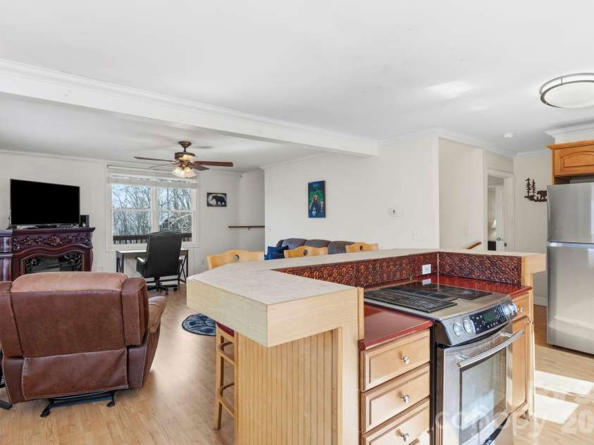 11 Roberts Drive, Swannanoa, NC 28778.  MLS# CAR4352970, YatesRealty ID 4734. Open Kitchen with island