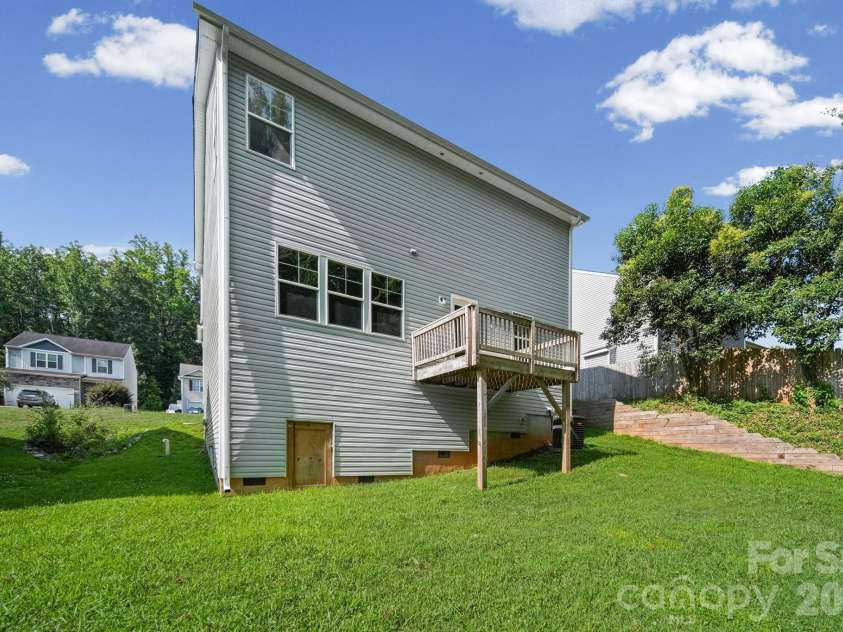 7725 Lane Drive, Charlotte, NC 28212.  MLS# CAR4395827, YatesRealty ID 47342. Backyard