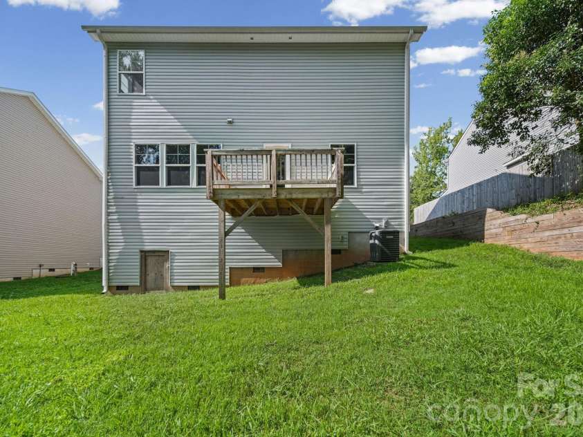 7725 Lane Drive, Charlotte, NC 28212.  MLS# CAR4395827, YatesRealty ID 47342. Backyard