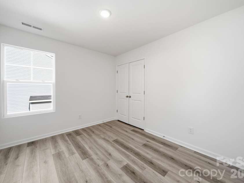 7725 Lane Drive, Charlotte, NC 28212.  MLS# CAR4395827, YatesRealty ID 47342. Bedroom 2