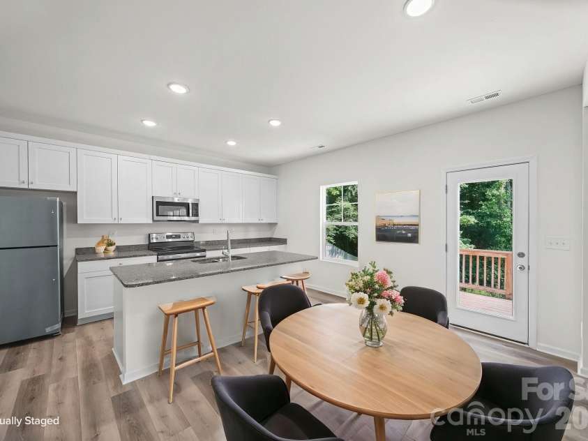7725 Lane Drive, Charlotte, NC 28212.  MLS# CAR4395827, YatesRealty ID 47342. Dining Room - Virtually Staged