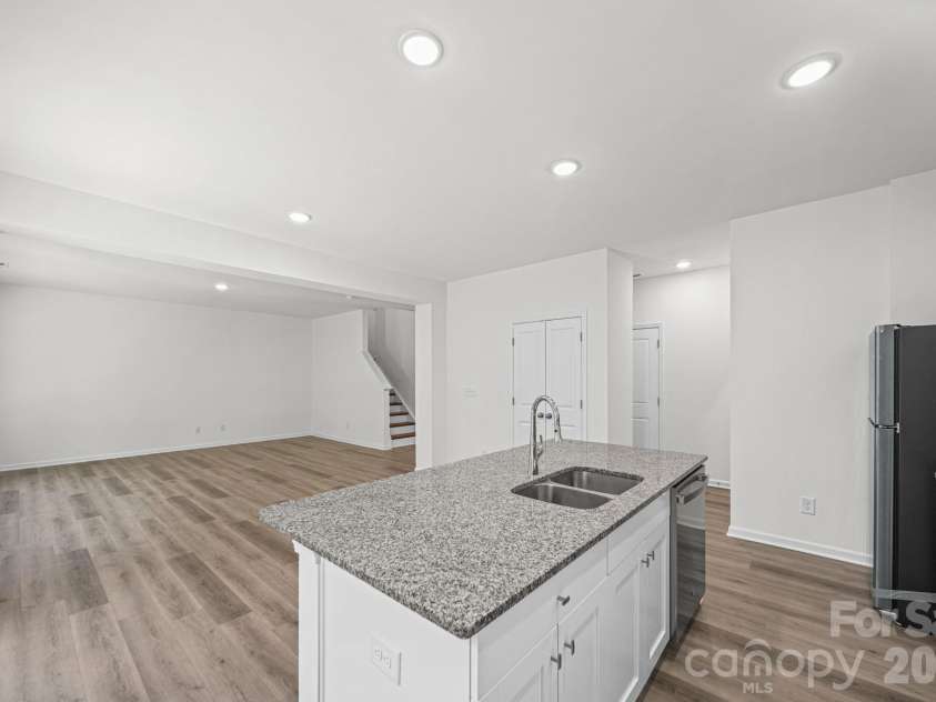 7725 Lane Drive, Charlotte, NC 28212.  MLS# CAR4395827, YatesRealty ID 47342. Kitchen and Great Room