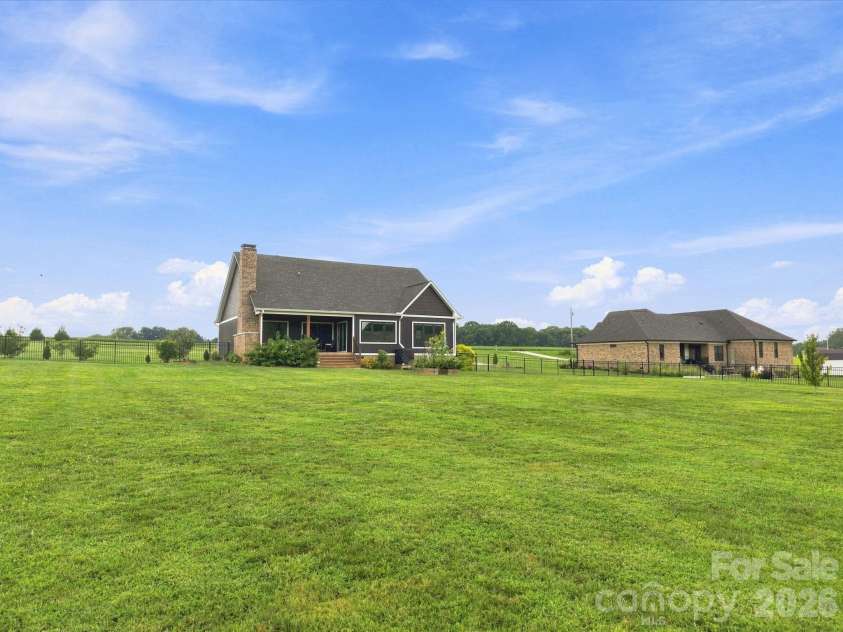 215 Cal Kennedy Road, Cleveland, NC 27013.  MLS# CAR4418527, YatesRealty ID 47347. Large Back Lawn