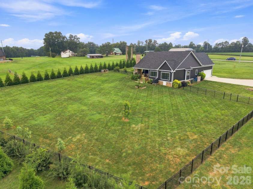 215 Cal Kennedy Road, Cleveland, NC 27013.  MLS# CAR4418527, YatesRealty ID 47347. Privacy Landscaping