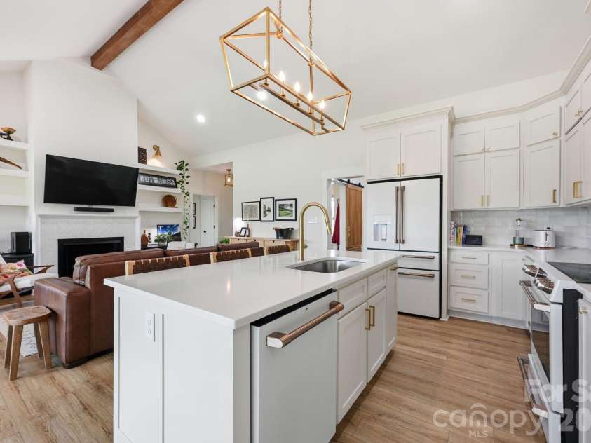 215 Cal Kennedy Road, Cleveland, NC 27013.  MLS# CAR4418527, YatesRealty ID 47347. Vaulted Ceiling with Exposed Beam in Kitchen