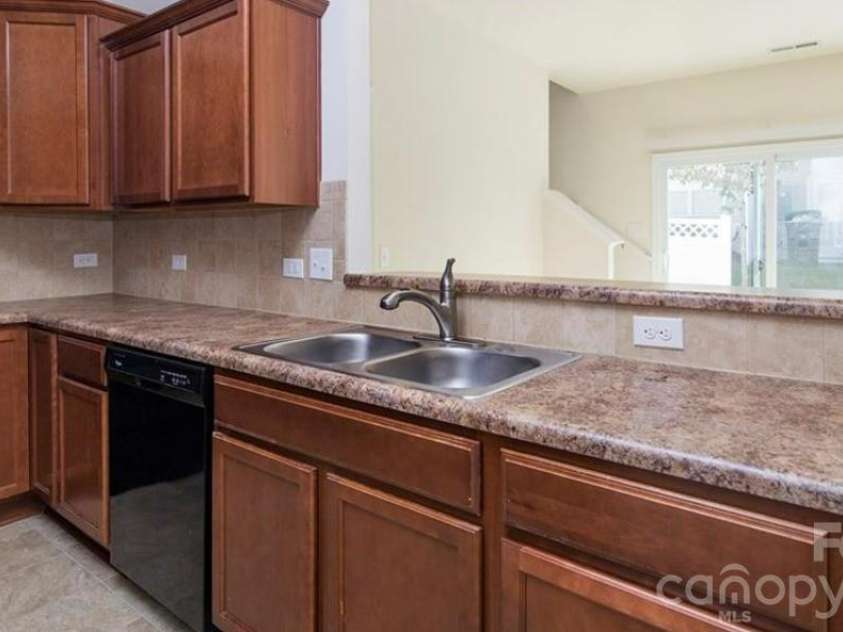 14416 Glendon Hall Lane, Charlotte, NC 28262.  MLS# CAR4418921, YatesRealty ID 47358. 