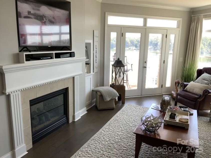 637 Williamson Road, Mooresville, NC 28117.  MLS# CAR4241846, YatesRealty ID 4736. Great Room with gas fireplace & built-ins